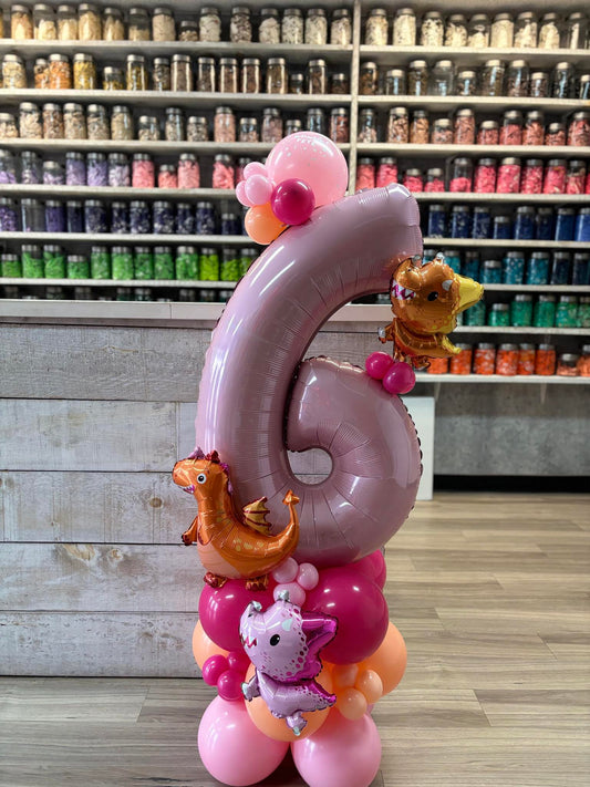 MONTAGE DE BALLON DINOSAURE ROSE